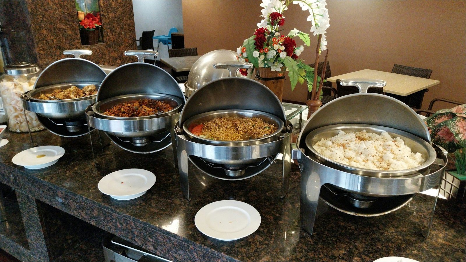Office lunch catering trays laid out on a long table ready for a corporate event