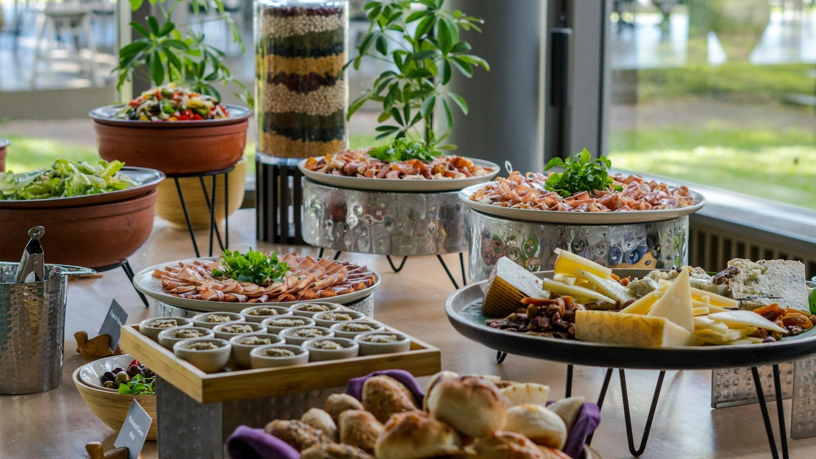 Catering trays with chafing dishes set up for a corporate event