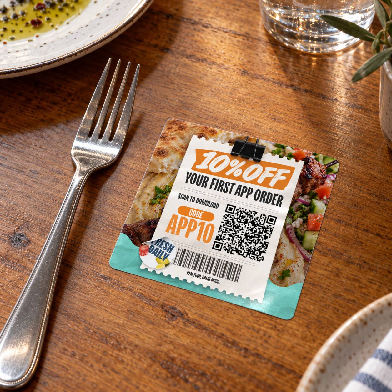 App launch campaign: to-go sticker with QR code (mockup), designed by CGRabbit for Garlic'n Lemons