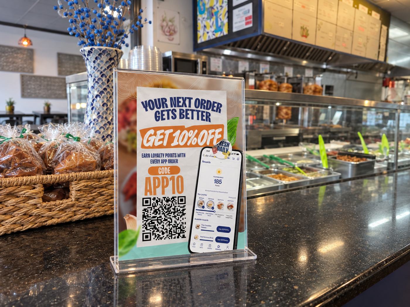 App launch campaign: counter table sign (mockup), designed by CGRabbit for Garlic'n Lemons