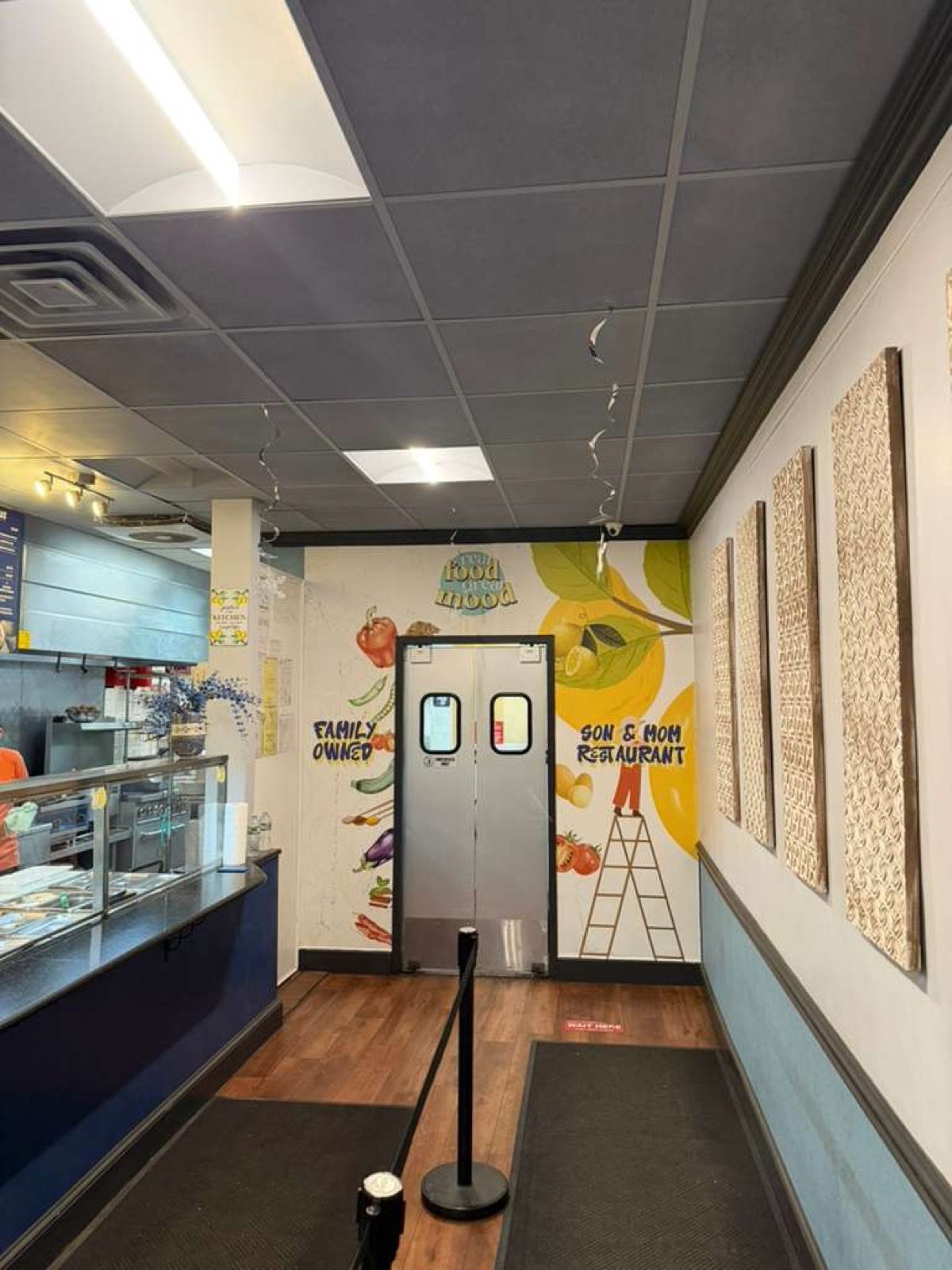 Family-owned signature wall, designed by CGRabbit for Garlic'n Lemons