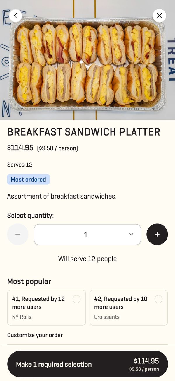 A catering platter open on a phone with photo, price per person and quantity